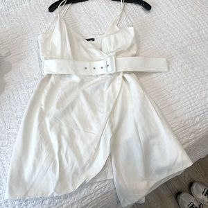 White shirt dress with belt.